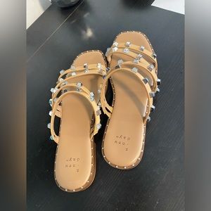 nude studded flat sandals